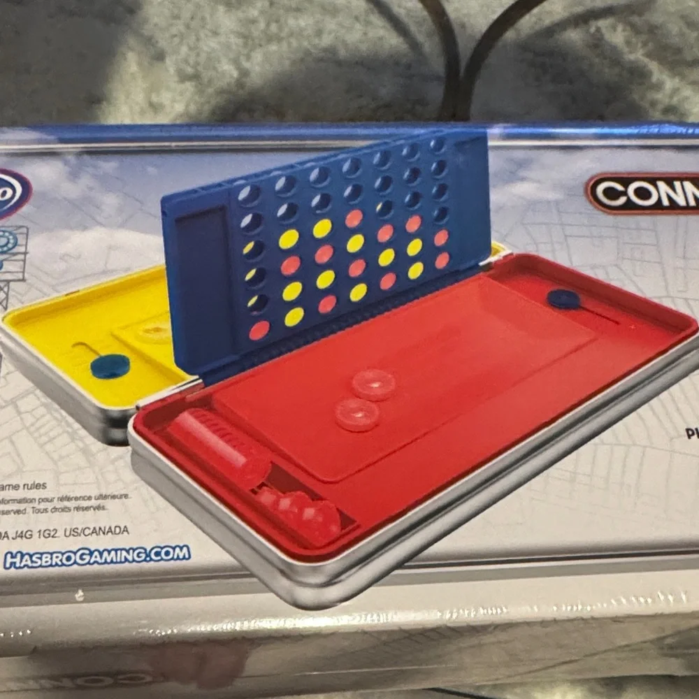 Hasbro Gaming Road Trip Connect 4 Portable Game Tin in Blue and Silver